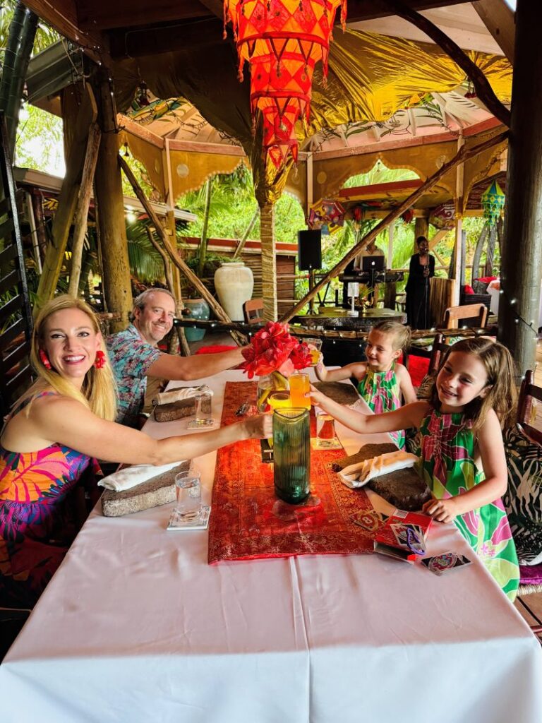 Family of four dining at Treetop Restaurant at Crystals Resort.